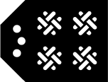 BC Multiple Communities Label icon. Black tag shape with four white over-under woven patchworks arranged in a 2x2 square. On left side are three white dots.